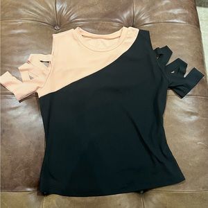 Color block, cold shoulder, cut outs, super cute women shirt.